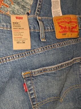 Brand New 559 Levi's light blue denim relaxed straight jeans with red tab 50x34